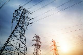 Power lines in a sunlit sky