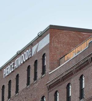 Pierce Atwood Portland, Maine office page banner featuring the top of the brick office building